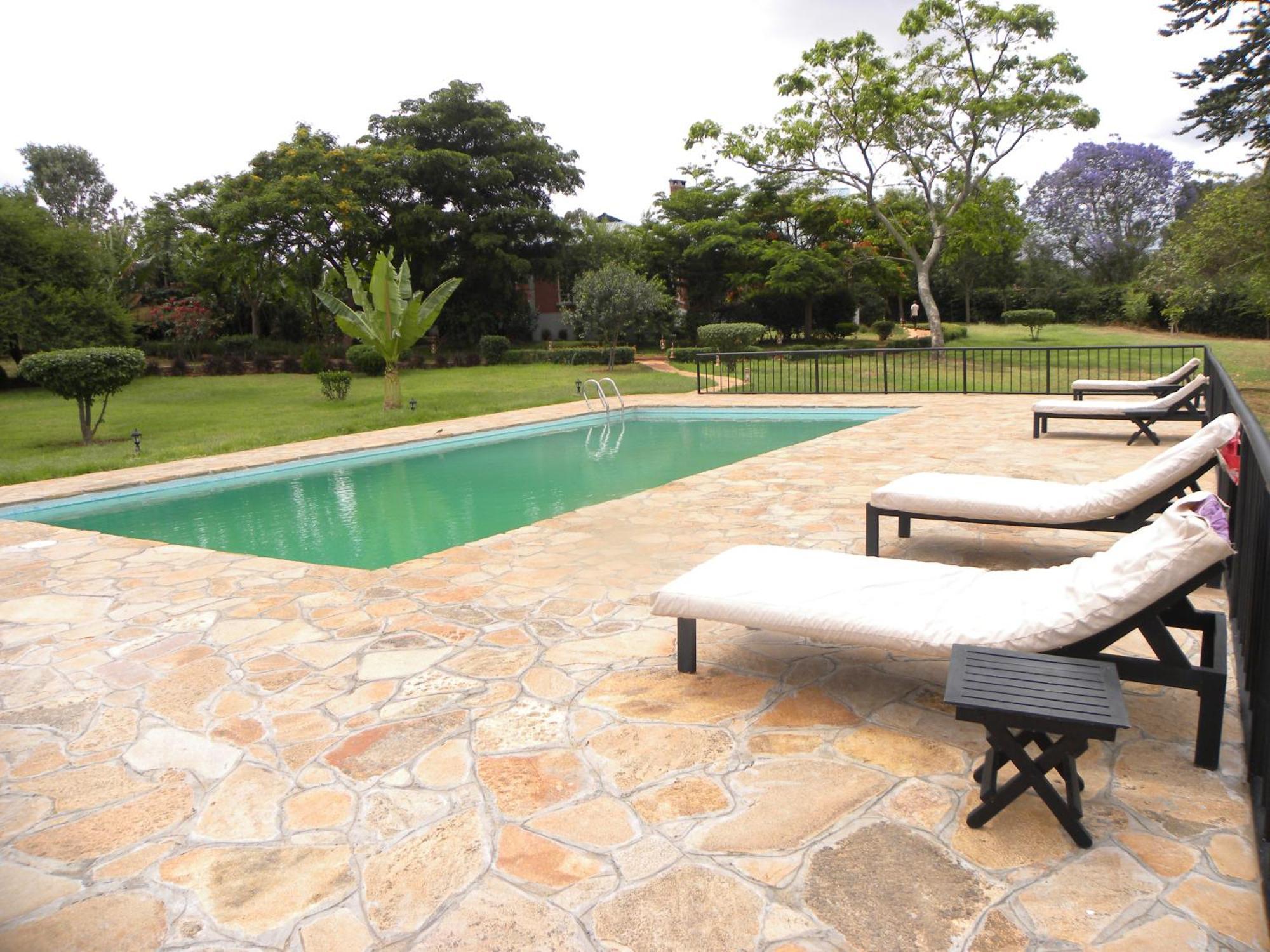 Olea Africana Lodge Karatu Esterno foto